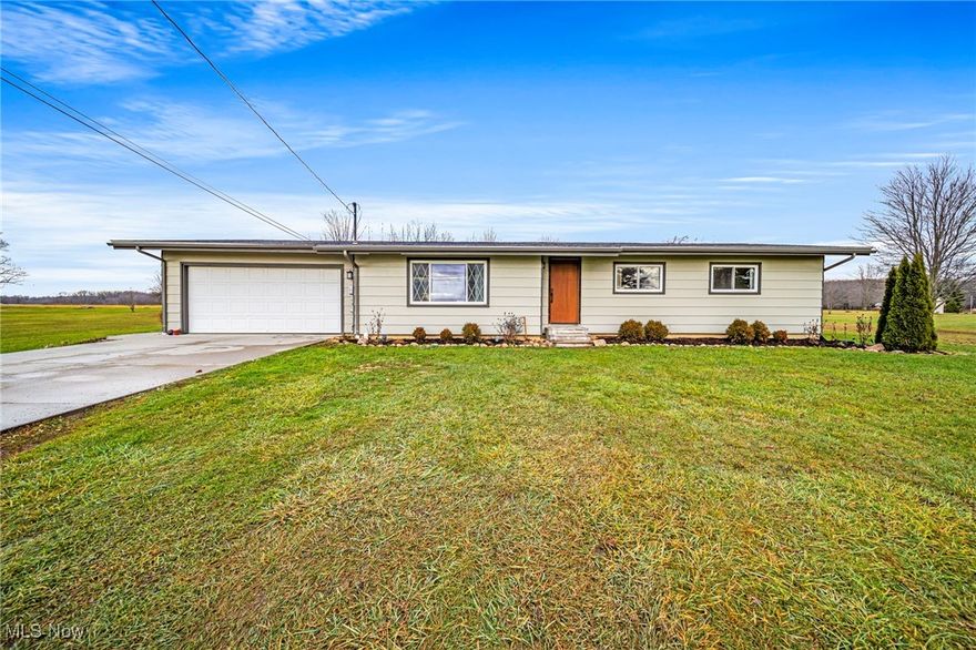 Welcome home, in beautiful Austinburg, Ohio! Set between Historic Jefferson Village & Harpersfield, NE Ohio's wine country, this 3 bed, 1.5 bath ranch is updated & ready for you to make it your own. Walk into an open concept w/vaulted ceiling & a wood beam stretching across the entire home. Inside, you'll find a large kitchen w/shaker cabinets, seafoam green subway tile, & all "Frigidaire, Gallery" kitchen appliances stay. All 3 bedrooms are on the main level & have all been recently repainted & 2 of them have new carpeting. The master looks out to the back yard & has access to the half bath that has recently been remodeled into the perfect little powder room. Most of the interior doors have been switched out to beautiful sold core wooded doors. Follow the newly carpeted basement steps down to the lower level. The basement has been partially finished w/a (furnished) bonus family room & extra bedroom/hobby room/office (furnished). The laundry room is also located on the lower level & is equipped with Maytag Bravos XL washer & dryer (gas), has been freshly painted & has plenty of room for storage. The other half of the basement is not finished but has been freshly painted & is ready to serve as a storage space/workshop. With the exterior walls of the basement water proofed & 2 sump pumps on the inside of the home & 1 on the outside, this proves to be a dry basement. A gas furnace was installed in 2016 & a new AC unit was installed in 2018. If the 2 car attached garage doesn't have enough room for storage there is a large, Amish built shed with a metal roof in the backyard. This property comes w/2 parcels, just shy of 2 acres, w/pear trees, grape vines & curved driveway that cuts across the front yard. There are flower beds that surround the home with butterfly bush, cone flower, milk weed, & much more. Imagine yourself, lounging on the freshly painted back deck, overlooking the 3 established garden beds, enjoying gorgeous, sunsets, daily!