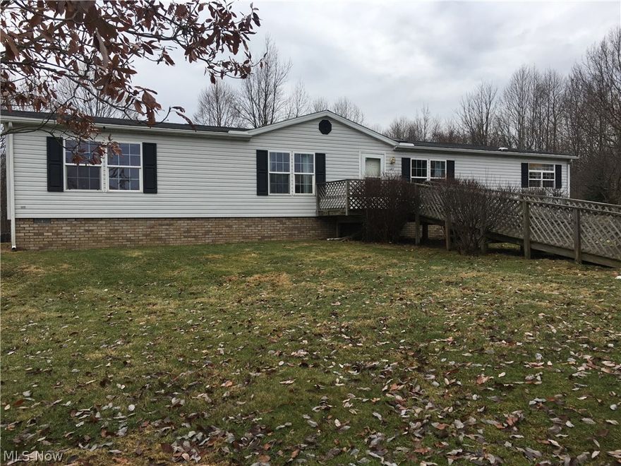 This charming 3 bedroom home sits on a quiet 7 acres in Paris Township! With a fenced in yard for dogs, multiple outbuildings, and partially wooded back yard, this property is versatile for everyone in the family! Check this property out and own your own little piece of the country while still only being a 20 minute drive to the city! Two of the outbuildings have concrete floors and electric! NEW washer/DRYER, dishwasher and garbage disposal! Furnace is 1 year old.