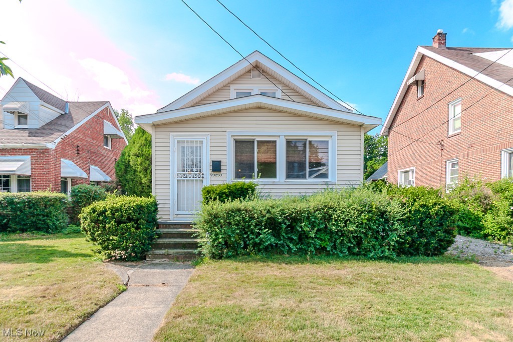 Charming Cape Cod in Euclid offering 2-3 bedrooms and 1 full bathroom. The main level features a sun filled front porch that leads into the cozy living room, a spacious eat in kitchen, and a large back room that can serve as a first floor bedroom or a family room for added living space. Upstairs you'll find two additional bedrooms. Step outside to a deep backyard that feels like a peaceful country retreat- while still enjoying the convenience of city amenities. This home is full of potential and ready for your personal touch.