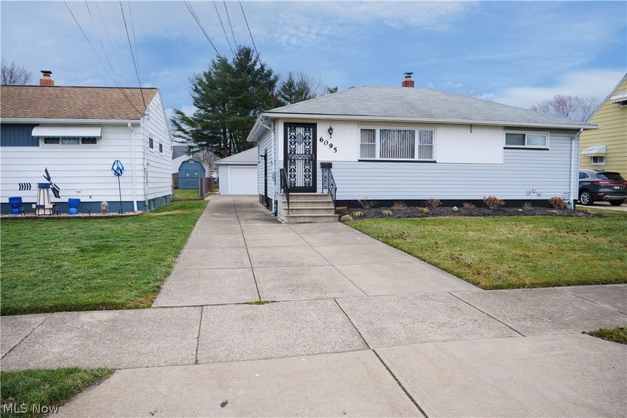 Welcome to 6095 Stark Drive. Pulling up to the property, you will notice its updated curb appeal, including new concrete front steps, vinyl siding, newer roof, gutters and downspouts, and windows (2021). The two-car attached garage has an updated garage door and opener. The fully fenced-in yard sits on a slightly larger lot than other properties and offers a nice-sized grass area behind the garage. Steel security doors are located at both the front and side entries. Glass block windows surround the home.
Entering through the side door, you are welcomed by the updated kitchen featuring beautiful wood cabinets, granite countertops, a tiled backsplash, and all appliances included. The washer and dryer are located in the basement and are included as well.
The freshly painted basement with new carpeting offers another large entertaining area complete with a bar, a fourth bedroom, and a full bath. Additional updates include an updated electrical box and water tank, a large utility tub, a basement storage area, and attic space for additional storage.
Upstairs, you’ll find nicely sized bedrooms with ceiling fans and a fully remodeled bath featuring a higher-end granite vanity and tiled shower. Lighting fixtures have been updated throughout, along with six-panel doors.
Located minutes from I-71 and I-480, the airport is a very convenient option for travelers, and there are always Ubers readily available. Enjoy the convenience of living in one of Cleveland’s most up-and-coming areas, Brook Park, home of the Cleveland browns. The community is surrounded by parks and features a recreation center with outdoor pool and soon to come restored indoor pool that is currently being restored.