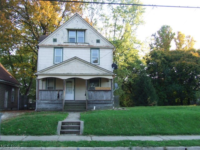 Great rental or large family home!! Colonial with 3 bedrooms on 2nd floor, 2 more possible bedrooms or offices on 3rd floor. Large living room, formal dining room and foyer with beautiful woodwork and pocket doors. Newly painted inside, newer high-eff furnace 2020, newer light fixtures, new water and gas lines. Convenient to highway and downtown Akron. (Current tenant uses dining room as bedroom).