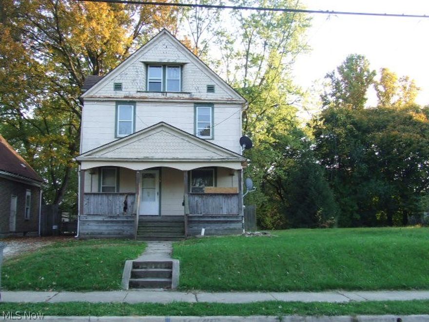Great rental or large family home!!  Colonial with 3 bedrooms on 2nd floor, 2 more possible bedrooms or offices on 3rd floor.  Large living room, formal dining room and foyer with beautiful woodwork and pocket doors.  Newly painted inside, newer high-eff furnace 2020, newer light fixtures, new water and gas lines.  Convenient to highway and downtown Akron.  (Current tenant uses dining room as bedroom).