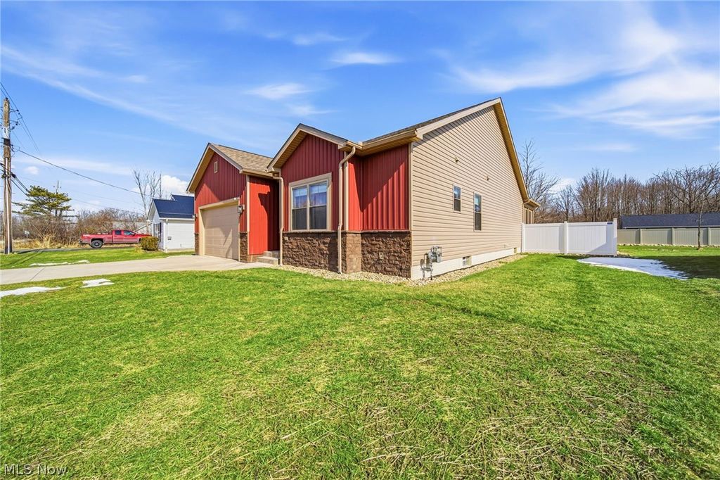 Photo of 537 Rome Rock Creek Road, Roaming Shores, OH 44084 (MLS # 5188407)