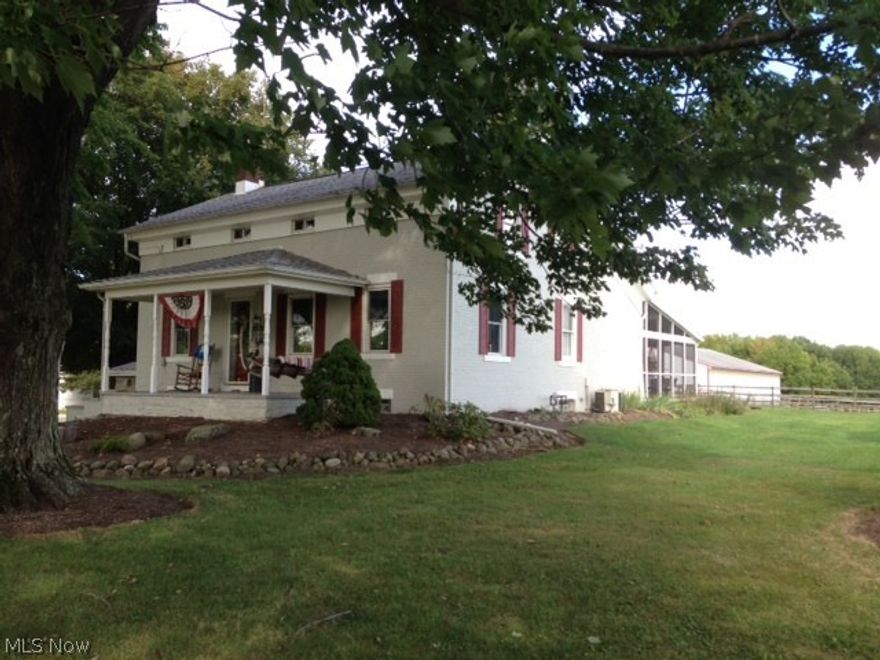 Just move in to this Pristine 150 year old Brick Home with a hammered cooper sink, restored Hardwood floors, 3 bedrooms with fireplaces, 2 full baths, large great room with fireplace, formal dining are and a full basement. Enclosed rear porch and wraparound covered porch on the front.  Exterior features include a 6+ car detached garage, 30 x 60 barn with 3 stalls, barn with shop and 3 additional stalls.  A 60 x 80 Indoor riding arena.  Property is cross fenced, power and water where you need it.  Truly a Gentlemen's farm.  Move in Condition and Free Gas on 13 Acres of land in Randolph Township.