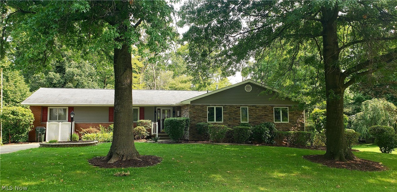 Spacious 3 bedroom, 2 bath duplex in Green. Large eat in kitchen- with appliances. Huge master bedroom with 2 walk in closets, 2nd bedroom on main floor also has a walk in closet. Large bathroom with both tub and separate shower. Large living room that leads out to a very nice enclosed sun room overlooking the beautifully landscaped yard. First floor laundry. The lower level has a family room with a fireplace. It also has the a huge bedroom and a full bathroom. Walk out basement and attached garage. Great location that is close to shopping, restaurants and the x-way. Call today for your private showing. Move in ready. This home is available for immediate occupancy. All applicants must pay for a credit/background check with Re/Max Edge Realty