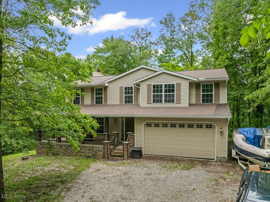 Welcome to this beautifully remodeled home, nestled on an expansive 18-acre property, offering serene country living with modern amenities! This stunning four-bedroom, two-and-a-half-bathroom home has been thoughtfully updated and is ready to welcome its new owners. As you make your way up the winding tree lined driveway you open up to the home. As you enter the first floor, you’ll find a spacious family room perfect for gatherings open concept updated kitchen featuring marble countertops, and a cozy den that offers flexibility for a home office or additional living space. The main level also includes a convenient laundry room and a half bathroom that opens to a large deck, ideal for outdoor entertaining and enjoying the picturesque views of the wooded backyard. Upstairs, you'll discover four generously sized bedrooms, including a grand master suite with its own private master bathroom. A second full bathroom serves the additional bedrooms, each offering ample space. The partially finished walkout basement provides additional living and recreational space, while the unfinished portion offers plenty of storage. The home also features an 80-gallon hot water tank, installed in 2013, ensuring comfort for the whole family. Outside, a charming creek runs along the back of the property, adding to the peaceful atmosphere. With 18 acres of land, three sheds for storage, and a brand-new roof installed in 2023, this property offers endless possibilities for outdoor activities and hobbies. Don’t miss the chance to own this updated home with plenty of space, both inside and out!