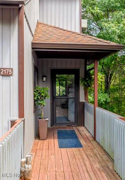 Amazing wooded/ravine view from all windows and deck! 2 bedrooms * 2 full baths * multi-level condo * Close to both National/Metro Parks and Portage Crossing * Vaulted great room with stone gas fireplace, 2 skylights and patio door to deck that overlooks the woods & ravine with a retractable awning * Kitchen with brand new stainless steel appliances and breakfast bar * Dining room with wood floors * 1st bedroom on main floor with double closets and full bath with shower * 1st floor laundry * 2nd floor loft bedroom with vaulted ceiling, skylights, full bath, walk in closet and storage area * 1 car detached garage and extra guest parking * New carpeting in great room and bedrooms * All new light fixtures * New paint * New tall toilets * New stainless steel kitchen appliances * New dryer * HOA covers most utilities, gas, water, sewer, trash, heat * 2 association pools * Must see today!