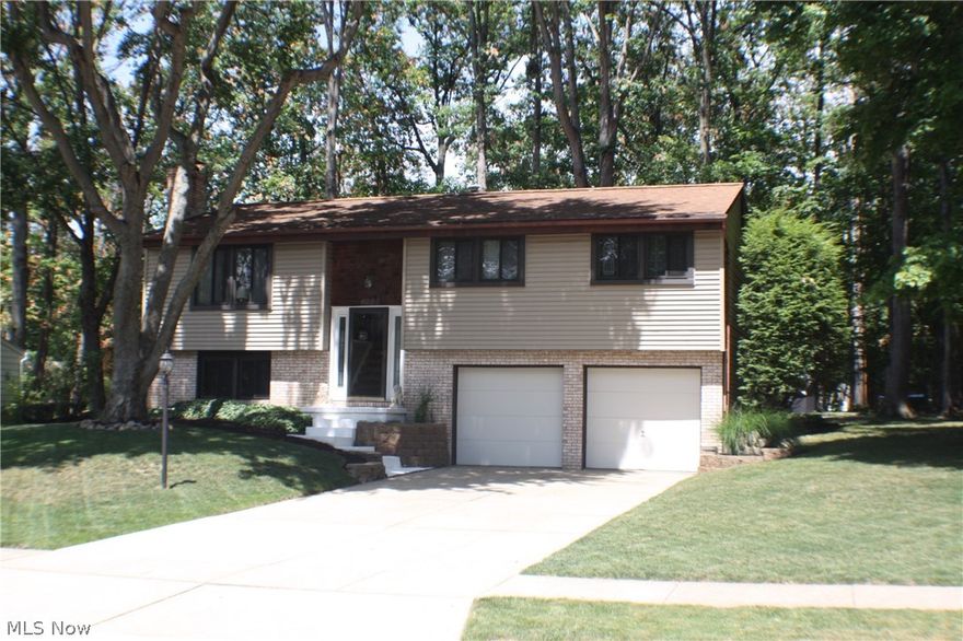 Absolute must see in this quiet Stow neighborhood, priced to sell fast! Come see this 1750 square foot home, nicely updated with plenty of room for the whole family on a park like lot. This home features two large living/family rooms, separate dining room, updated kitchen, three bedrooms, two and a half baths, a two car attached garage and a nice outdoor patio area with a deck. Schedule your private showing now!