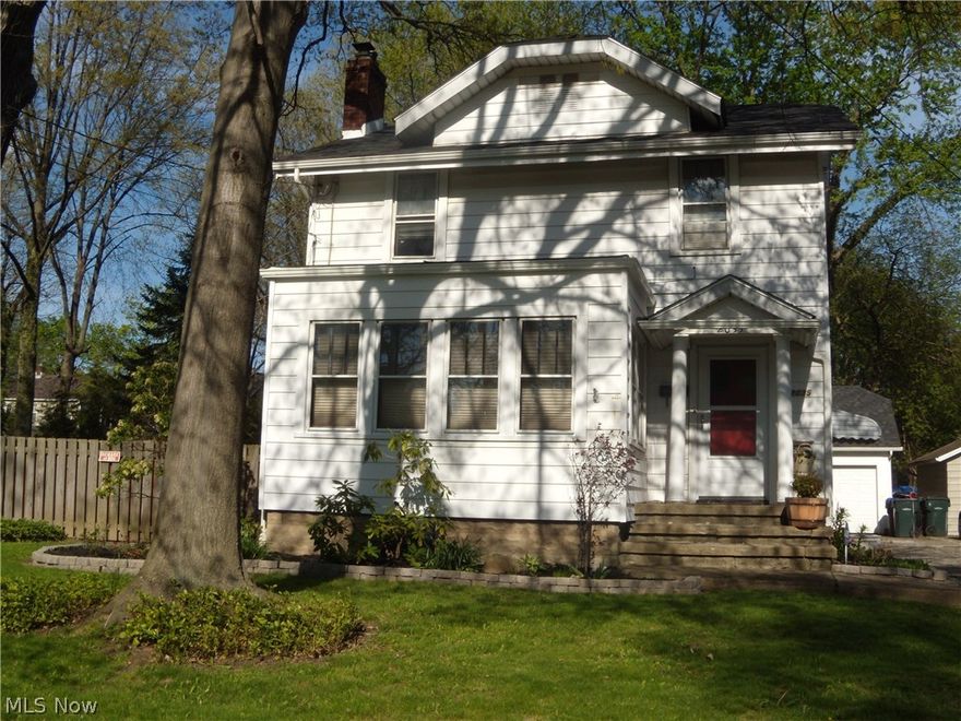 Beautiful Colonial in Cuyahoga Falls with charm and character. Great home for entertainment and family functions. 3 bedrooms 1 1/2 baths on a large lot! This home has been meticulously cared for and has many updates. Newer carpet, fresh paint, and beautiful woodwork throughout. The large living room features a wood burning fireplace and built in cabinets. There is a beautiful built in wall length cabinet in the formal dining room. Lots of cabinet space in the updated kitchen which also features a dining area. 3 nice bedrooms and an updated full bath on the second floor. In the waterproofed basement you will find a rec room, office, laundry room, and new half bath. Step out back and enjoy the outdoors on the rear deck and the private fenced in yard with a patio and fire pit. New roof and gutters 4 years ago. All appliances stay including the washer and dryer. 1 year home warranty included. Great location convenient to Portage Crossings, The Riverfront, and Route 8.