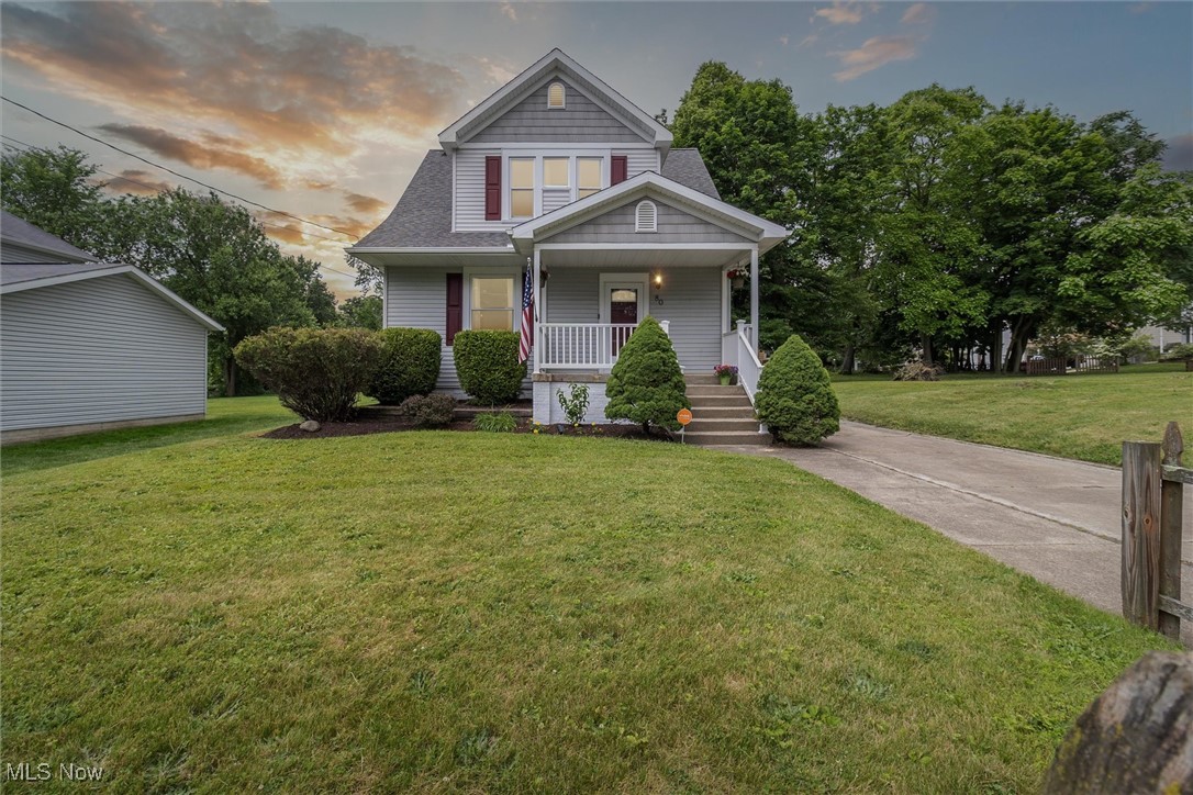 Welcome to this meticulously maintained century home, proudly cared for by the same owner for the past 26 years. From the moment you arrive, the curb appeal of 80 N Valley Street is undeniable — a home that radiates timeless charm, thoughtful updates, and an evident pride of ownership. Step inside and be greeted by soaring 9.5-foot ceilings, original woodwork, and an abundance of natural light throughout. The spacious living room flows seamlessly into the dining room, creating the perfect setting for gatherings or quiet evenings at home. The beautifully updated kitchen offers modern convenience while honoring the home’s historical character.
A versatile parlor room on the first floor provides endless possibilities — whether you need a home office, bedroom, reading nook, or playroom. Also on the main level is a full, updated bathroom featuring a walk-in shower, ideal for guests. Upstairs, you'll find a generous primary bedroom with vaulted ceilings and incredible closet space, along with two additional bedrooms and a full bath with tub. Dual staircases add a touch of historic charm and functionality. The walk-out basement offers even more flexibility, including a finished room lined with cabinetry, space for a home gym, workshop, or storage, and multiple additional rooms to meet your needs. Enjoy morning coffee or an evening unwinding on the covered back porch overlooking your peaceful backyard with no neighbor on one side — your own private retreat. There are too many updates to list them all but here are a few: newer windows, updated flooring and paint, vinyl siding, refreshed electrical, HVAC, and a newer roof and gutters on the garage. This home has all the charm you are looking for in a century home, plus all of the conveniences of modern living. All of this in a prime location near the Towpath Trail and a growing array of restaurants and shops. This is a rare opportunity to own a truly special home that blends the best of old and new — don’t miss it!