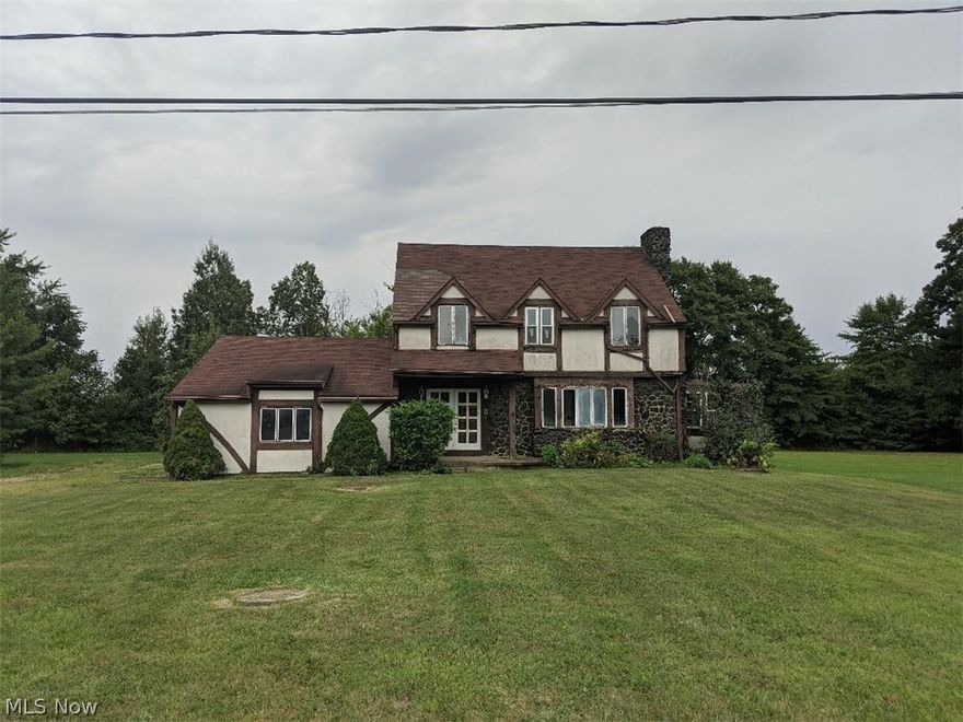 4 bedroom 1.5 bath colonial with eat in kitchen and formal dining room and living room with fireplace and sunroom and fenced in back yard with in ground pool and laundry room and mud room and 2 car attached garage and full basement and 4 bedrooms and right next to Hickory Grove Golf Course