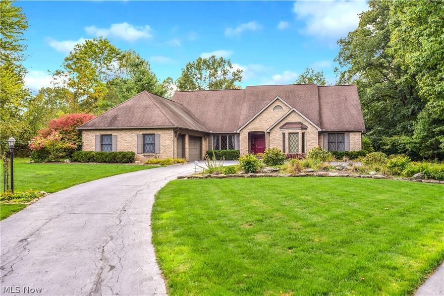 THIS HOME IS A SHOW STOPPER! 3 Bedroom Home with Superior Quality and Exceptional Workmanship. Home Features Include: Front Foyer leads you into this Magnificent English Country Estate featuring a Large Center Great Room with 12 Foot Cathedral Beamed Ceiling with Tons of Built-ins and Gas Fireplace, Awesome Custom Kitchen with Center Island with Tons of Storage, New Sink, Stainless Steel Dishwasher, Microwave, & Refrigerator, Appliance Garage, Counter Seating, Breakfast Area, & Desk Area, Formal Dining Room with Tray Ceiling & Chair Rail, HUGE Master Bedroom with Large Sitting Area, Tray Ceiling, and Awesome Master Bath with Double Vanities, Private Water Closet, Jacuzzi Tub, Shower/Steam Room, 2 other Large Bedrooms, & 2nd Full Bath. There is also An Awesome Billiards Room & An Amazing RESORT STYLE Spa Room with 4-6 Person Sauna, 6 Person Spa, Steam Room, & Exercise Area with Equipment. The Private Office off the Spa Room could be a 4th Bedroom. Home also offers a First Floor Laundry