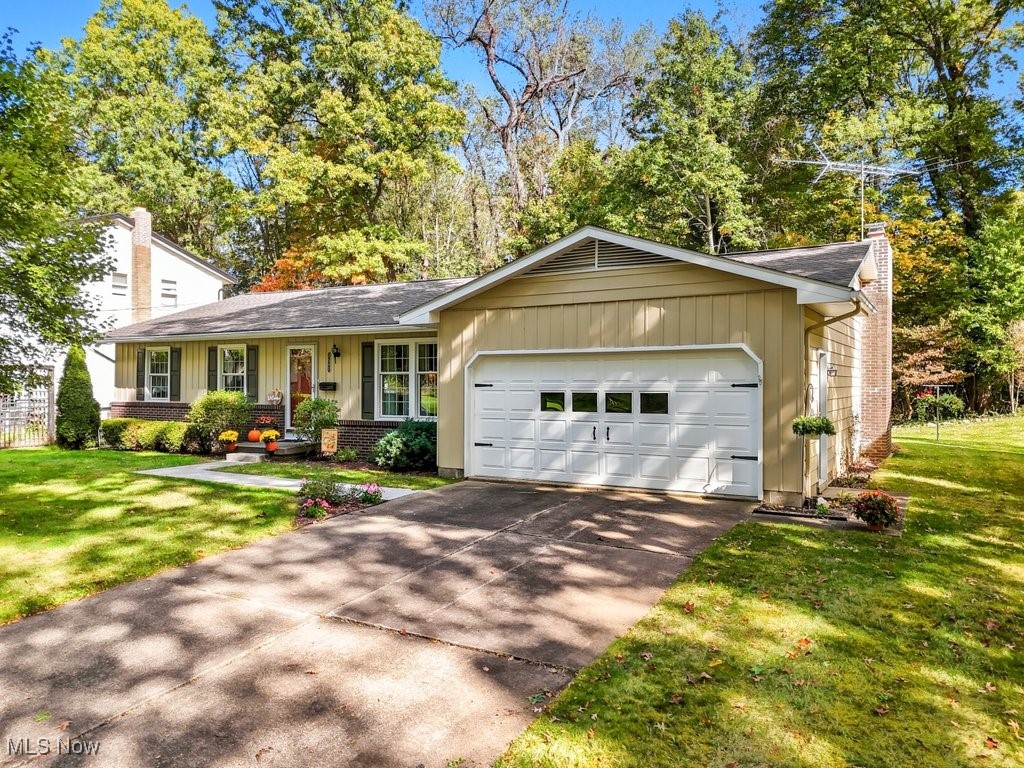 Welcome to this beautifully maintained ranch home in one of Kent’s most desirable neighborhoods! Just minutes from Kent State University’s main campus, this charming residence is tucked away on a quiet dead-end street lined with trees and sidewalks, with not one but two nearby parks to enjoy.
Lovingly cared for by the same owner for 40 years, this 3-bedroom home offers timeless appeal and thoughtful updates throughout. Most rooms (bedroom, dining and living) feature original hardwood floors (some under carpet), and the primary suite includes a private bath renovated in 2018 with a new shower, vanity, LVT flooring, commode, and lighting.
The formal living and dining rooms provide great space for entertaining, while the eat-in kitchen—with its newer appliances—opens to a cozy family room highlighted by a wood-burning fireplace with a new liner and damper (2023). From here, sliding doors lead to a roomy 3-season room—perfect for casual dining or simply watching the abundant wildlife in the tranquil backyard. Step outside to enjoy the patio and the serene, wooded views of the adjacent university-owned land.
Additional features include a large basement with plenty of storage and laundry area (washing machine purchased in 2025 and dryer stay), and an attached two-car garage. Major updates include: furnace (2024), roof (2014), A/C (2013), hot water tank (2012), windows (2012), and full exterior painting (2018).
Ranch homes in this location rarely come available—schedule your showing today and see why this neighborhood is so loved!