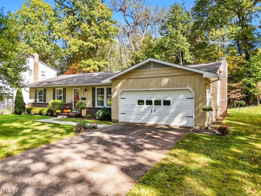 Welcome to this beautifully maintained ranch home in one of Kent’s most desirable neighborhoods! Just minutes from Kent State University’s main campus, this charming residence is tucked away on a quiet dead-end street lined with trees and sidewalks, with not one but two nearby parks to enjoy.

Lovingly cared for by the same owner for 40 years, this 3-bedroom home offers timeless appeal and thoughtful updates throughout. Most rooms (bedroom, dining and living) feature original hardwood floors (some under carpet), and the primary suite includes a private bath renovated in 2018 with a new shower, vanity, LVT flooring, commode, and lighting.

The formal living and dining rooms provide great space for entertaining, while the eat-in kitchen—with its newer appliances—opens to a cozy family room highlighted by a wood-burning fireplace with a new liner and damper (2023). From here, sliding doors lead to a roomy 3-season room—perfect for casual dining or simply watching the abundant wildlife in the tranquil backyard. Step outside to enjoy the patio and the serene, wooded views of the adjacent university-owned land.

Additional features include a large basement with plenty of storage and laundry area (washing machine purchased in 2025 and dryer stay), and an attached two-car garage. Major updates include: furnace (2024), roof (2014), A/C (2013), hot water tank (2012), windows (2012), and full exterior painting (2018).

Ranch homes in this location rarely come available—schedule your showing today and see why this neighborhood is so loved!