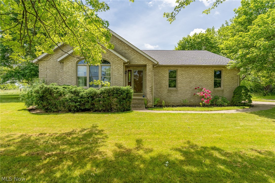 Looking for a rare find with +/- 13.56 acres and an all brick ranch home with over 1700 sq. ft. 3 bedrooms, 3 full baths. Cathedral ceilings and open floor plan. Quality built, one owner home. Schrock kitchen cabinets and Anderson windows. Thick oak wood detailing and trim. Some wallpapers and borders. Decor needs updating. HUGE huge opportunity. Sits way off the road. Has a pond that needs some work. Shed for additional storage. Walkout lower level access. Shingles were put on recently. Good bones. Ready for the buyer that isn't afraid of some work and updating. Well and septic. Priced as is.