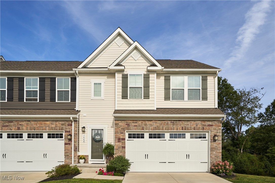 Step into this beautifully maintained townhouse, just three years young and full of charm! This desirable end-unit home offers 3 spacious bedrooms, 2.5 baths, and a versatile office nook, all within minutes of shopping, dining, highway access, and more. Enjoy the privacy of a backyard that backs to green space, along with an extra side yard that only an end unit provides. Inside, the 9-foot ceilings and open-concept main level create the perfect blend of comfort and style. The modern kitchen boasts stainless steel appliances, an eat-in area, and a center island with seating, perfect for everyday living or entertaining. Upstairs, the primary suite features two walk-in closets and a luxurious bath with dual sinks and a sleek, glass-enclosed shower. The two additional bedrooms offer ample closet space, while the full hall bath includes a bathtub. A cozy office nook provides the ideal spot for remote work or study. The convenient second-floor laundry makes chores a breeze. The unfinished basement is full of potential—whether you envision a home gym, playroom, media space, or extra storage, it’s ready for your personal touch. A spacious two-car garage offers plenty of room for both parking and storage. With the HOA taking care of exterior upkeep, snow removal, and lawn care, you’ll enjoy the ease of low-maintenance living in a home that feels like new. Don’t miss your chance to call this move-in-ready townhouse your own!