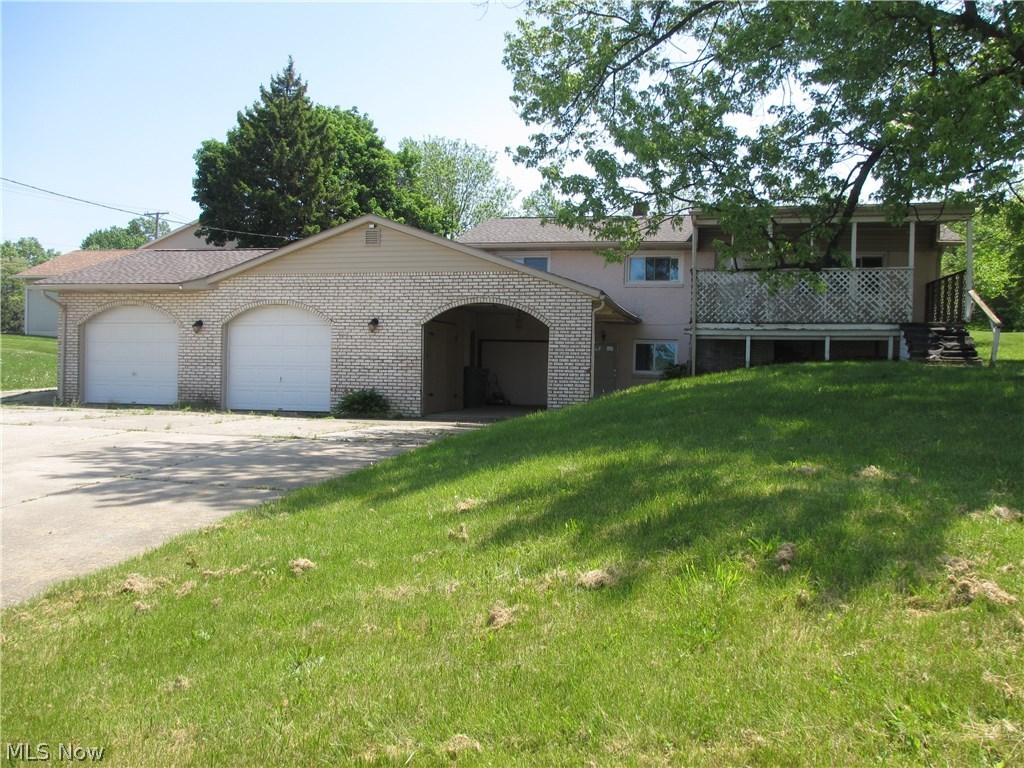 Great location close to I-77 and North Canton, this .69 Acre, Commercially Zoned property to sell "AS IS". 1672 sq. ft. building was formerly used as apartment rental and has a 624 sq. ft. Garage. Perfect lot to build your new Office or great investment to buy and fix up.