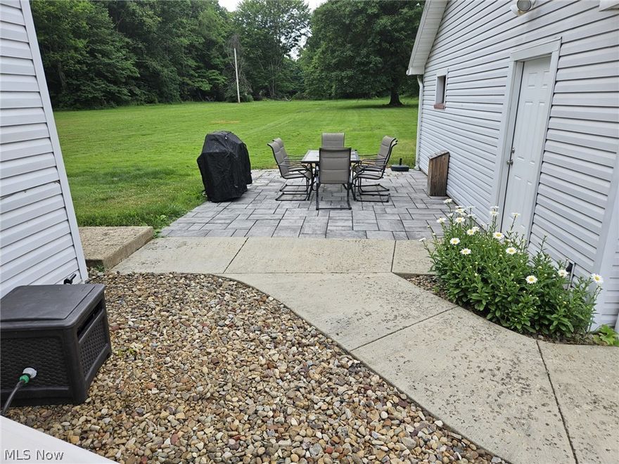 This charming single-family home located at 11486 Rapp Rd in New Middletown, OH  offers a peaceful and private retreat on 4 acres of sprawling land. With a 4 bedrooms, 2 full bathrooms and 1,544 sq.ft. of finished living space spread across 2 stories, this property provides plenty of room for comfortable living. The home features a classic design with a traditional layout, including a cozy living room, a functional kitchen, and spacious bedrooms.   The hot tub ready concrete pad, basement fireplace and heated garage will make the cold winters enjoyable and give you ample space to store you tools and toys.  The large lot size offers endless opportunities for outdoor activities, gardening, or simply enjoying the picturesque surroundings. Whether you're looking for a serene escape from the hustle and bustle of city life or a peaceful place to call home, this property offers the ideal blend of comfort and tranquility. Don't miss out on the chance to make this delightful home your own and experience the beauty of country living in New Middletown, OH.