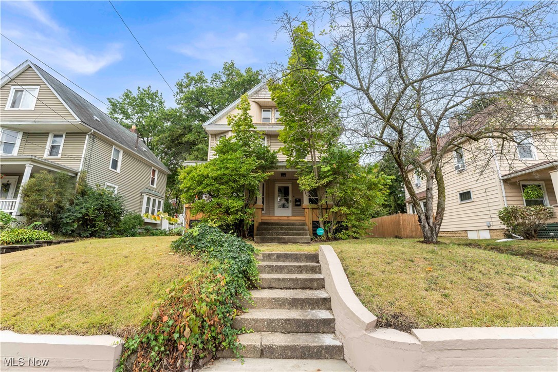 Welcome to this beautifully updated single-family colonial in Akron! A large covered front porch sets the tone before stepping inside to a bright living room filled with natural light from multiple windows and a charming fireplace with mantel! The floor plan continues into the dining room and into the updated kitchen featuring stainless steel appliances, a gorgeous backsplash, and reverse osmosis water system! A convenient laundry room sits just off the kitchen with washer and dryer included, and a full bath with standing shower completes the main level! Upstairs, you’ll find three spacious bedrooms with luxury vinyl plank flooring and a second full bathroom! The finished third-floor attic offers versatile space for a home office, playroom, or guest room! The full basement provides plenty of storage, and the paved driveway adds convenience! This home is move-in ready with neutral paint throughout and major updates already completed, including all new kitchen appliances, a new furnace and AC system, and updated windows (2008)! These improvements reduce ongoing maintenance costs, making it a smart addition to any investment portfolio! The home’s layout, modern finishes, and proximity to Highland Square, downtown Akron, local parks, and the Towpath Trail make it attractive to renters and owner-occupants alike! For out-of-area investors, full-service professional property management is available, including leasing, marketing, tenant communication, and even rehab services! Whether you’re looking for your own home or a cash-flowing rental property, this colonial is a fantastic opportunity in a desirable location! This won’t last long! Schedule a showing to see it for yourself!