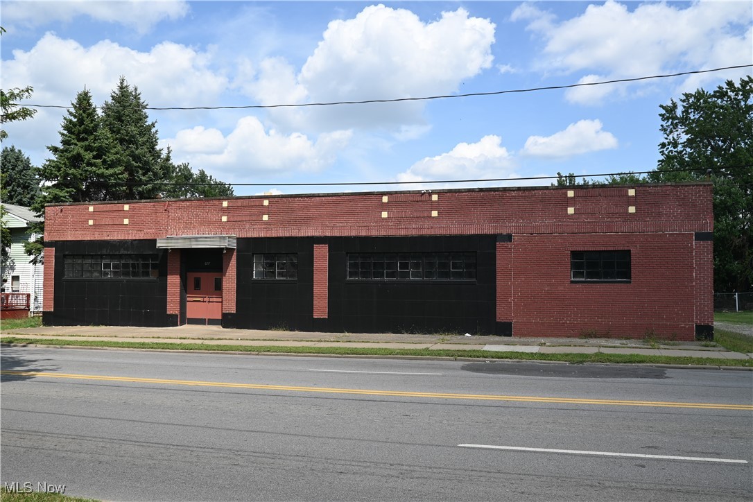 Price of building includes additional, adjacent vacant land listed separately for $65,000. Large, open building for many possibilities. Seller had plans for a grocery store but now changing plans. The 9,300 sq ft building is divided into 2/3 and 1/3 parts, allowing separate functions in each side. The bigger side is mostly open space with a "bar-like," a long counter for display or checkout area. It was last used as a night club, containing a kitchen (mostly dismantled but has sink area and a large hood), has men's and women's restrooms, and a "VIP" room. The other 1/3 portion of the buildind is a large open space with separate office, kitchen, and restroom. Seller has removed all debris, and restored electricity and plumbing. All utilities are fully functional. Seller also installed new floorings and lightings. Building has full basement with walkout access. Potential business can be retail, storage, private functions, occasions venue, or private clubs. Motorcycles can be stored in the basement, just an idea. Security system, cameras and monitor convey. Shelves and furnitures do not convey.