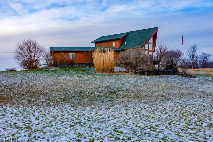 Beautiful 3 Level A-Frame Home situated on 4.61 acres with a gorgeous view of Rawiga Golf Course across the street. This home is a Linwood Home-Canada with western Canada cedar that features a First Floor Master Suite with a full bath and an oversized master closet. Off the Master is a Sun Room/4-season Room. The Kitchen and Great Room has breathtaking views out of the wall of windows and Vaulted Ceilings. The Kitchen has granite counter tops with center island and all kitchen appliances included it opens to the Great Room with a fireplace and Kitchen eating area with slider to wrap-a-round deck. The 2nd floor offers a loft and 2 more Bedrooms with double closets and another Full Bath.  There is a 1st floor laundry room  3 car attached garage with additional parking. Walk-out lower level with sliders to patio with hot tub, a Family Room with fireplace along with a Full Bath, Bedroom & walk-in closet. (Furnace, LVT Flooring, Cabinets refinished '23- A/C, H20, Exterior Paint '22- Deck Railing'21- New Water System/Water Filtration System, Garage floor, Septic Pump and Aerator '20- Roof'16) Call today for Showing!