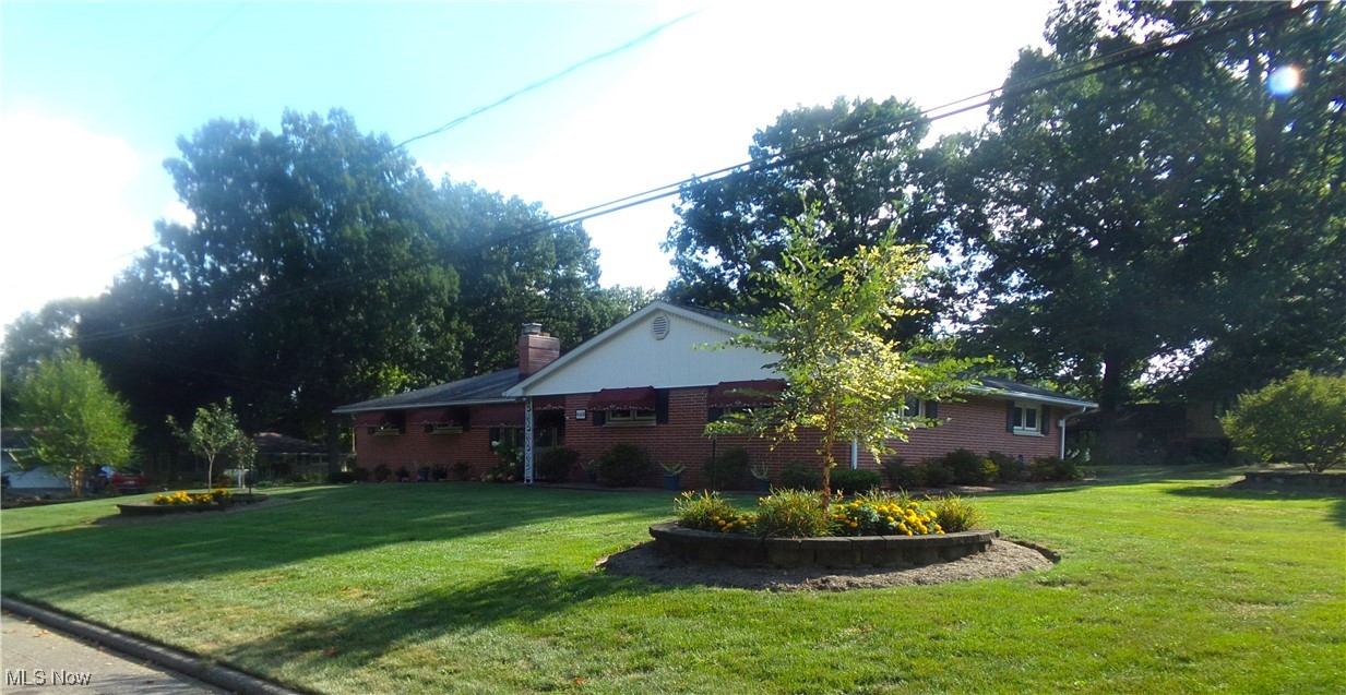 Welcome to this beautifully maintained brick Ranch, wonderfully located in a sought-after Stark County neighborhood. This well-preserved, 3 Bedroom, 3 full bath home has a floor plan that offers spacious living as well as plenty of storage space throughout! All 3 bedrooms are very nice-sized, and the master includes a full ensuite. If you like to entertain, this home has LOTS to offer! The dining room extends out to a large 4-season room that then opens up to the back patio, providing you with a great setting for family gatherings at holidays or special events, PLUS... the lower level has a massive open floor plan that includes a family room, recreation room and bar area with another full bath. Situated on a corner lot, this home is one of the beauties of the neighborhood! Other amenities include: a 2-car, heated garage with ceramic block walls and an interior storage room, outdoor shed, lawn sprinkler system, invisible dog fence, the comfort of having a climate control hot water steam heat, upgraded to include central A/C.