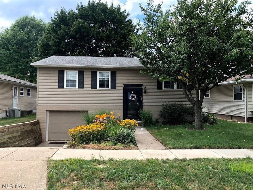 Welcome home to this lovingly maintained home. This beautiful home offers 3 bedrooms all on the main floor with a full bath, linen closet and coat closet with access to the attic. Also on the main floor you will find the kitchen that comes equipped with refrigerator, stove, dishwasher and garbage disposal. Directly off the kitchen is your dining area that leads you out the sliding glass door on to the back deck or directly into your living room. The downstairs is a spacious finished basement with a half bath. All block windows allow light to filter into this area. Directly off the basement is your laundry area and access to the 1 car garage (new concrete poured 2018) that has key-less entry. This beautiful turnkey home is waiting for you!! Schedule your showing today!!