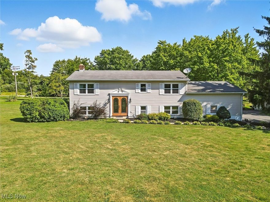 Happiness & great memories resonate in this well cared for, much loved 1 owner home! Now its your turn to write the next chapter! Easy living 2 level split offers 4 nice sized bedrooms, full baths on both levels & a handy attached 2 car garage w/newly glazed Nature Stone flooring. The Lower level welcomes you in to the cozy carpeted family room, with a wood burning fireplace, brick feature wall, a handy corner area (11X10) just perfect for your home office space, the large laundry room, 2 of the bedrooms & most importantly - walk out access to the 32x16 pool! This is such an inviting set up & is the place where everyone who visits will want to be!  Pool goes from 3-9 feet & has a brand new solar cover & a recent "leak proof" inspection. Relax in the shade with a book & a beverage under the Sunsetter awning, surrounded by the  Nature Stone surface & the 2 Trex decks!(25x14 & 15x9) (one for dining and one for grilling!). The pool area is completely fenced for privacy & protection in maintenance free vinyl. The Pool components have always been kept inside the garage-not exposed to the weather. The Upper floor offers 2 more bedrooms, a large Living Room with a picture window overlooking the pool, a dining area, roomy kitchen, oak cabinets, Corian counters & an island that seats 5 for extra dining space.Outside there's plenty of mature landscaping, a cute 2-pond water feature, the well maintained asphalt driveway, lots of yard space for games & entertaining & the detached garage. Garage is 32x24, w/concrete floor, WB stove & is wired for a generator. Extra space can be found in the attached 16x10 shed. The sellers are leaving the extra replacement glass for the front door & the Cub Cadet mower, for your mowing pleasure. Carpets have all been freshly cleaned (August 2025) & septic pumped in May 2025 (3 tanks). Sump crock is outside of the house, in the front yard area. Sellers usually shut down the pool in the 2nd week of September-so get here soon!