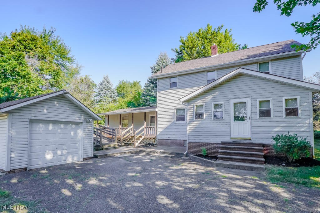 Set on 1.5 acres in a great location, this property offers a private setting along with impressive garage space! The outbuilding has room for up to four cars, concrete floors, 220 electric, and a wood stove, making it ideal for car enthusiasts, hobbies, or extra storage.
The main level features a living room with hardwood flooring that opens to a bright sunroom, a dining room, and a kitchen with plenty of cabinet and counter space. A first floor master bedroom sits next to a full bath, and the laundry is also on this level.
Upstairs are two additional bedrooms, a second full bath, and a bonus room that can be used as an office, playroom, or extra storage.
A covered porch provides a spot to enjoy the outdoors and peaceful country setting. With convenient access to main roads, a central location and Perry Schools, this is a must see!