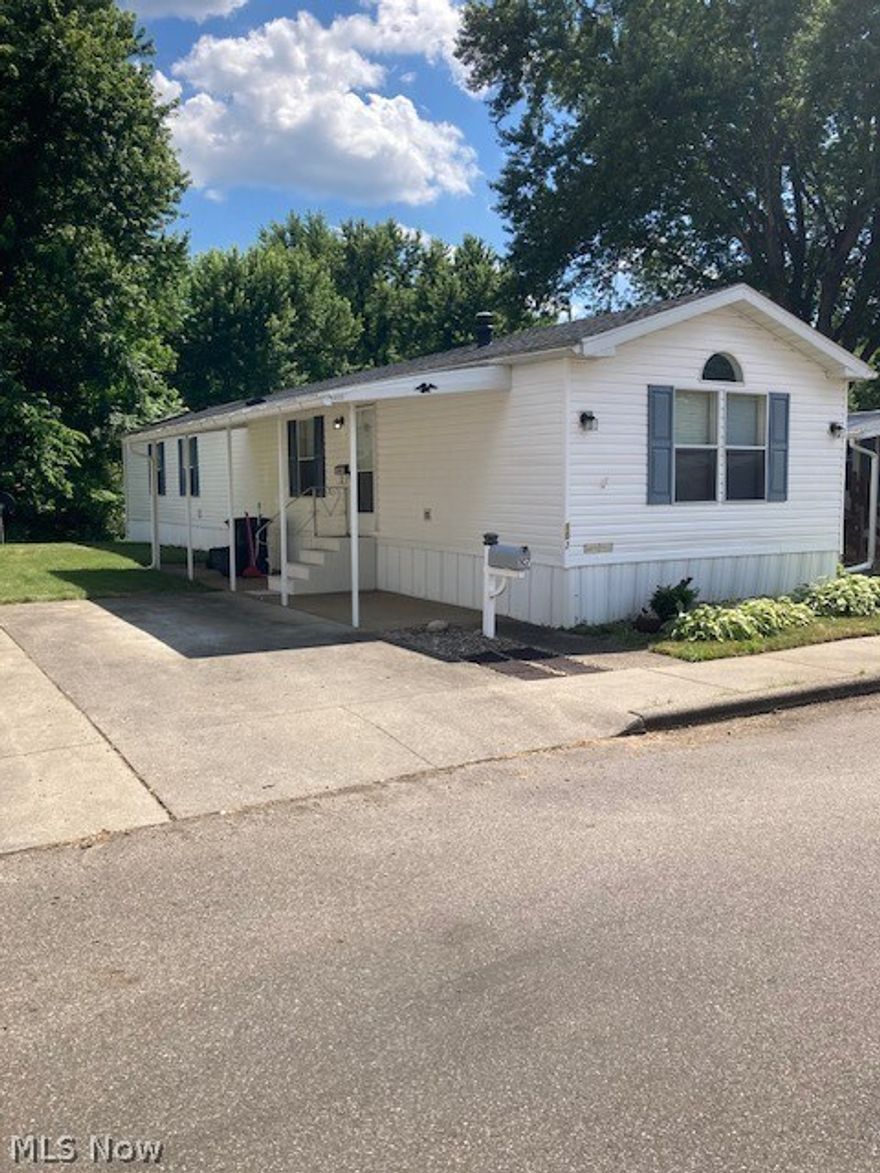 Stop and see this lovely home on Pompano Lane! This 2-bedroom home has a lovely master bedroom with a walk-in closet, garden tub and plenty of room. The eat in kitchen opens into a nice living room with an electric fireplace for those chilly winter days! Updates include: a water tank, heat tape on water pipes, AC blower, carpet, vanity and toilet. There is also a storage shed for outdoor use! Don't miss out on this great opportunity!