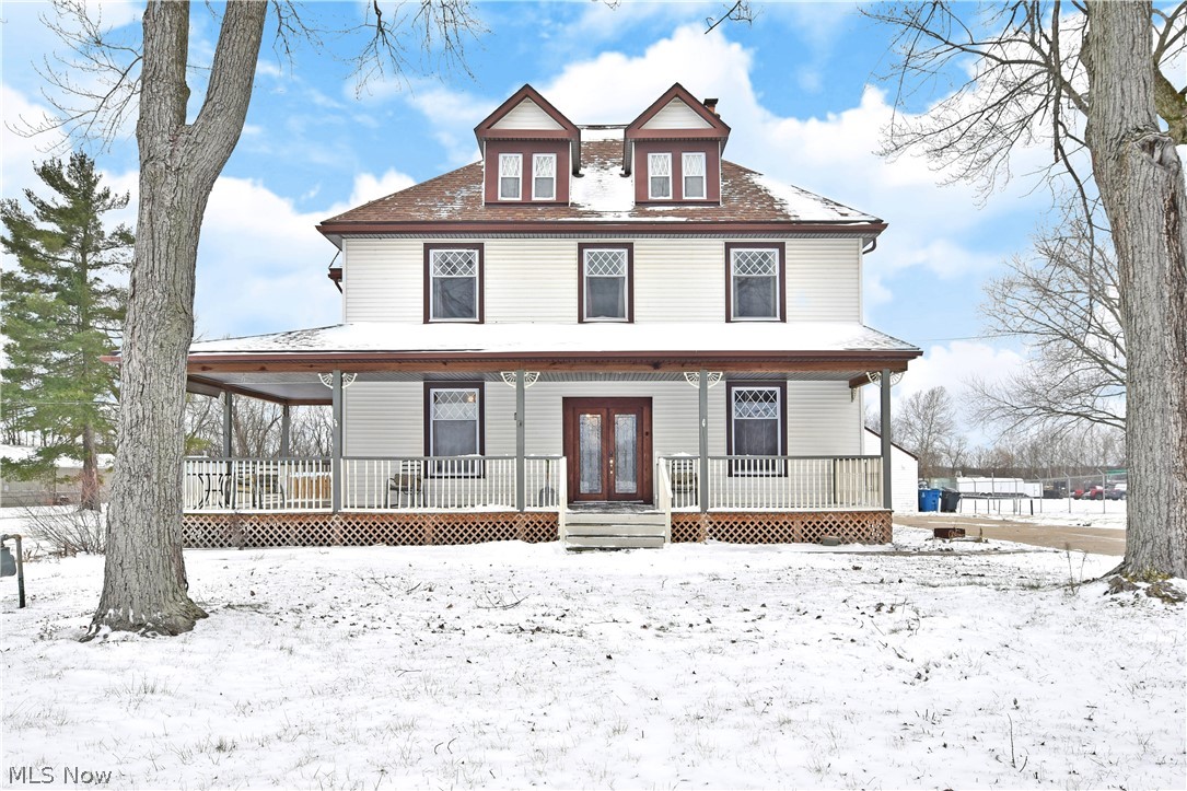 Spaciously unique and offering property as substantial as the home, this expansive Niles residence brings three floors of finished living space spanning up to seven potential bedrooms! Delighting with open farmhouse styling with updates throughout, the sheer amount of available room is something you need to see in person to appreciate as near each is oversized in stature. A picket lined covered front patio wraps around to a partially fenced yard with 28' round pool and rear deck. Inside the glass lined entry doors, the main hall sweeps past living, formal dining a pair of bedrooms and a half bath before opening into the kitchen, just past the main staircase. Here, a multitude of cabinets include eat-in dining with a corner mudroom near the deck. Four massive bedrooms line the second floor with an exquisite corner bath, awash in natural light as it showcases a soaking tub, glass shower and attractive tiled flooring. A second stairway provides first floor access. At the third level, the