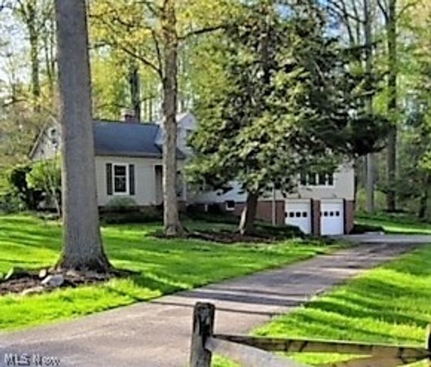 Tranquil living at its finest... Wonderful 3 bedroom 3 full bath cape cod on just over an acre - the setting is absolutely picturesque with wooded tree lines and a rolling hillside. Considerably larger than it appears, the interior boasts gleaming hardwood floors, crown molding, solid panel doors, large rooms and a warm, welcoming feel. Spacious living room with custom shelving and a wood burning fireplace. The formal dining room with built in corner cabinets is just off the kitchen and provides ample room for those large family gatherings and holiday dinners. The eat in kitchen is centrally located and provides access through sliders to the rear deck. The sprawling great room with cathedral ceiling and loads of natural sunlight is the perfect place to relax or entertain. Convenient first floor office. Fabulous first floor master bedroom with cathedral ceiling, access through sliders to a rear deck, an enormous walk in closet and en-suite bathroom. Two nicely appointed bedrooms and a f