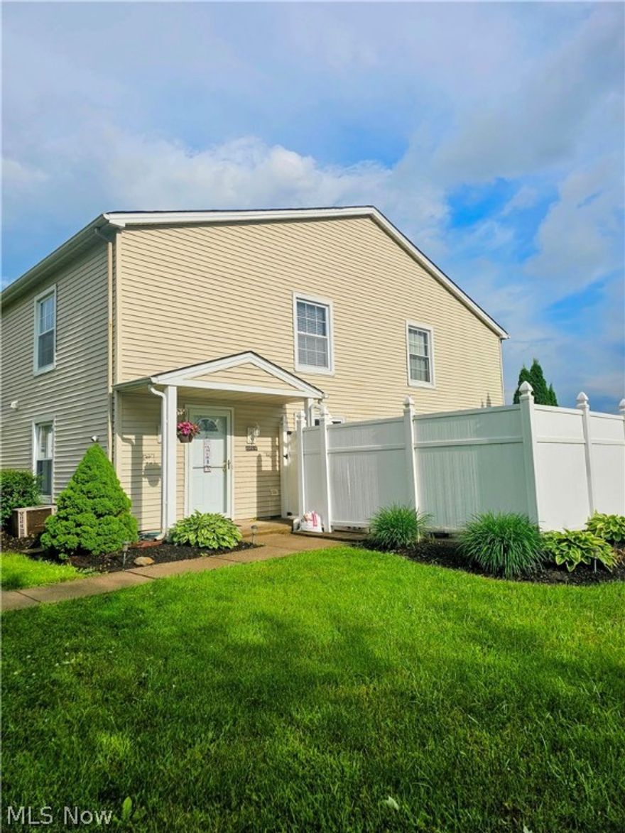 Move right in this lovely updated condo in a private area of Ivy Hills.  It features a simple open floor plan with half bath and laundry on the first floor.  Two bedrooms with an updated full bath on the second floor. Relax on the beautiful private enclosed patio or head to the pool for a relaxing day. Notice the view of the front yard is open and private.  Many updates including the gorgeous flooring, bath with shower, painted throughout, garbage disposal, refrigerator, toilet, electric Box 2021. New roof expected July/Aug. All appliances stay. Don't wait.