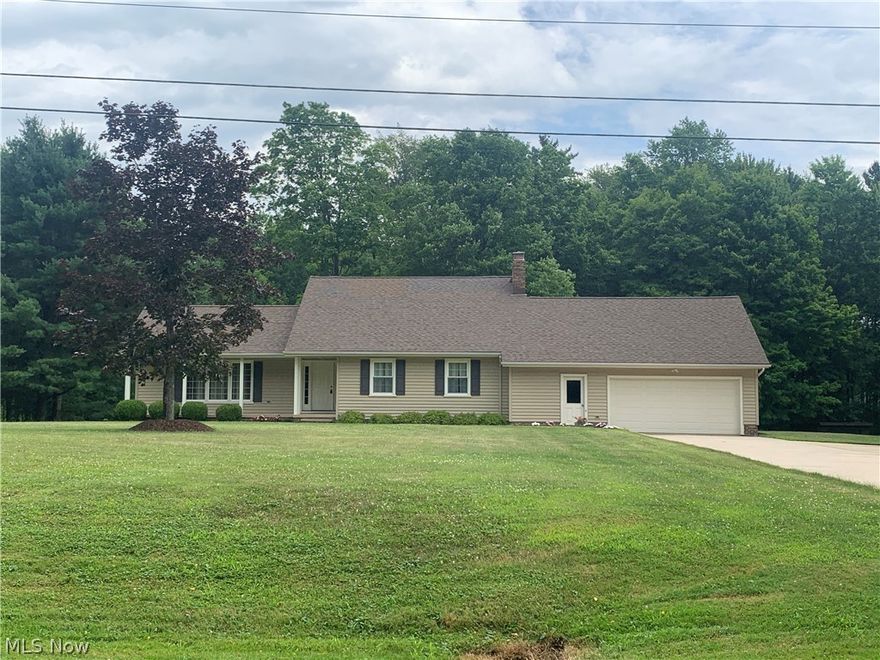 This lovely 4-bedroom, 3-bathroom cape sits on a breathtaking 2.7-acre secluded lot. The spacious formal living room features ample windows and a sliding door that opens to a lovely patio. The kitchen boasts quality wood cabinets, granite countertops, a pantry, and all appliances. Adjacent to the kitchen, you'll find the formal dining room. Both bedrooms on the first floor, including the primary suite, are impressively spacious. The primary suite features a private full bath with a granite-topped cabinet. The second bedroom on the main floor could easily double as a den or family room. Upstairs, two additional bedrooms and a third full bath await. Additionally, you'll discover an incredible walk-in attic with ample storage space. The property also includes a two-car attached garage, a full concrete drive, and a detached shed. The generous unfinished basement features glass-block windows. The furnace and air conditioning were updated in 2012, the water heater in 2016, and the roof in 2007. Nestled on a private drive shared by only five homes, this property offers a tranquil and idyllic setting for those who cherish a country lifestyle.