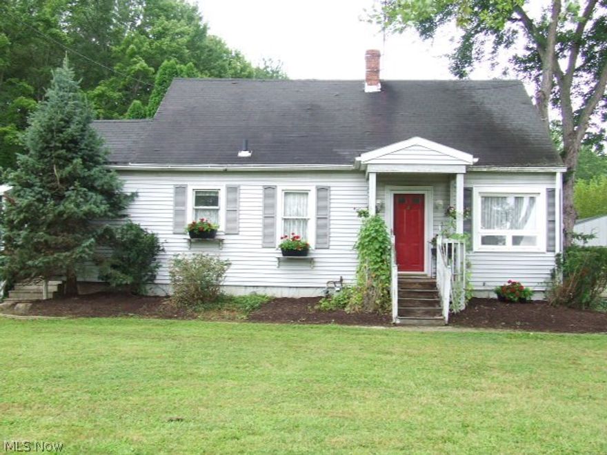 Charming rustic cape in Copley offers an opportunity to own a home for the price of rent!  Wide plank pine floors in this light filled living room, with bonus screened porch sitting just behind the double French doors.  Large, open eat-in kitchen with lots of counter and storage space.  First floor master and full bath complete the main living area.  Two large additional bedrooms upstairs.  Full basement with storage, laundry and extra shower.  Extra large garage for storage or workshop.  Plenty of private, flat, green yard for gardening or play.  Some TLC and sweat equity will make this the home you've been waiting for.