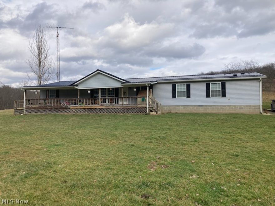 Private country setting on just under 10 acres- 4 bedroom and 2 1/2 bath spacious ranch with large open rooms. Loaded with wildlife, 24x24 detached garage, 24x32 pole building. Recent improvements include- outdoor wood boiler system for extra low utilities, newer furnace and A/C, new metal roofs as well as modern cosmetics. Call today for a showing!!