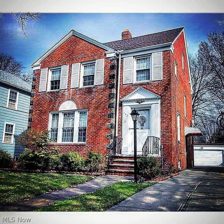 Charming 4 Bedroom 1.5 bath Colonial w/private beach access.  Living & Dining room have beautiful hardwood floors, vaulted ceilings & lots of windows that let in natural light. Spacious kitchen with plenty of counter space and new tiling. The 2nd floor offers 3 bedrooms with newer carpet with wood floors under and full bath. The third floor 25 X 10 finished room can double as an additional bedroom or office space.  Fully finished basement with bar & wood burning fireplace is the perfect spot for entertaining.Screened in back porch, 2 car garage and large back yard make this home a can't miss. Minutes from downtown, University Circle, Cleveland Clinic, the lake and many shopping opportunities.