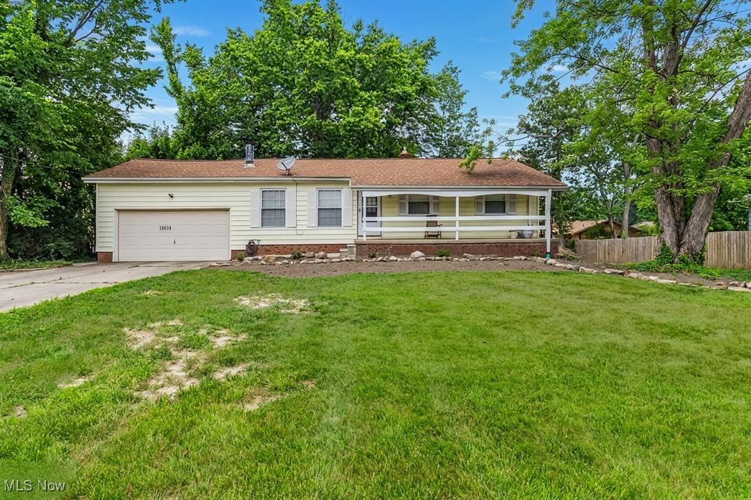 Sweet and charming move-in ready ranch home boasts effortless single-floor living and updates throughout. Highlights include: * A sleek, recently updated kitchen with soft-close Shaker cabinets, dove-tailed drawers, granite countertops, stylish backsplash, and stainless appliances * A sun-drenched living room with fireplace, adjacent to a dining area featuring classic built-in cabinetry * A beautifully renovated full bathroom with modern vanity, new flooring, fixtures, and tile surround * Original hardwood floors, modern light fixtures, vinyl replacement windows, and an attached 2-car garage * Additional features: finishable basement with tall glass block windows and direct exit to the backyard thru a little hallway that is dedicated for gardening tools and toys. Conveniently located near major highways, parks, golf courses, schools, shopping, Costco, restaurants, and more, this home offers the perfect blend of functionality and accessibility. Strongsville schools! Basement was waterproofed by Ohio State waterproofing company abt. 5 yr ago. $75 per year warranty (included for the first year). Also 1 yr General warranty from Cinch is included.