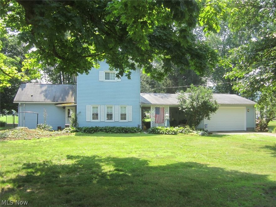 Nice 2 story home on a large triple lot! This home also features a 24 x 17 covered breezeway, perfect for entertaining those summer BBQ's! Lots of updates, including a new garage door in 2017, new 200 amp breaker box in 2017, new carpet in living room and both bedrooms in 2017, 50 gallon hot water tank approximately 3 years old. There is a large hidden storage area off of the 2nd bedroom that could be used as a playroom. Shower area in bathroom is from Bathfitters. There is a partial fenced in area for your pets. Any mineral rights seller would own passes to the buyer.  Seller if offering a 1 yr. America's Preferred home warranty.
