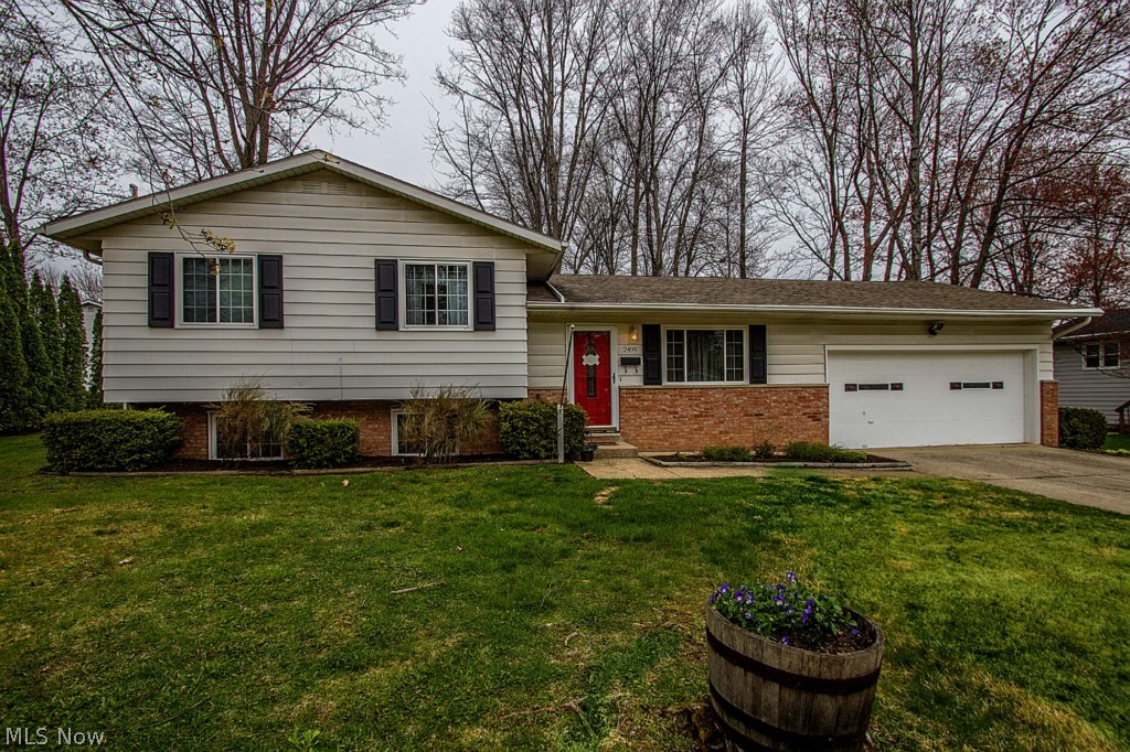 Welcome to this wonderful 3 level split with hardwood floor and family room addition on the back! Skylights, and updated decor make this home refreshing and spacious. 3 Bedrooms and 2 full baths upstairs, including a master bathroom. Main floor has hardwood, and an addition on the back, which offers great open layout. Lower level has a very large family room, with plenty of light. Large unfinished area with laundry room. Garage is extended for tons of storage, and there is additional storage in the attic and crawl space! Other recent updates include: New furnace in 2014, and Dishwasher in 2015. Call for a showing today!