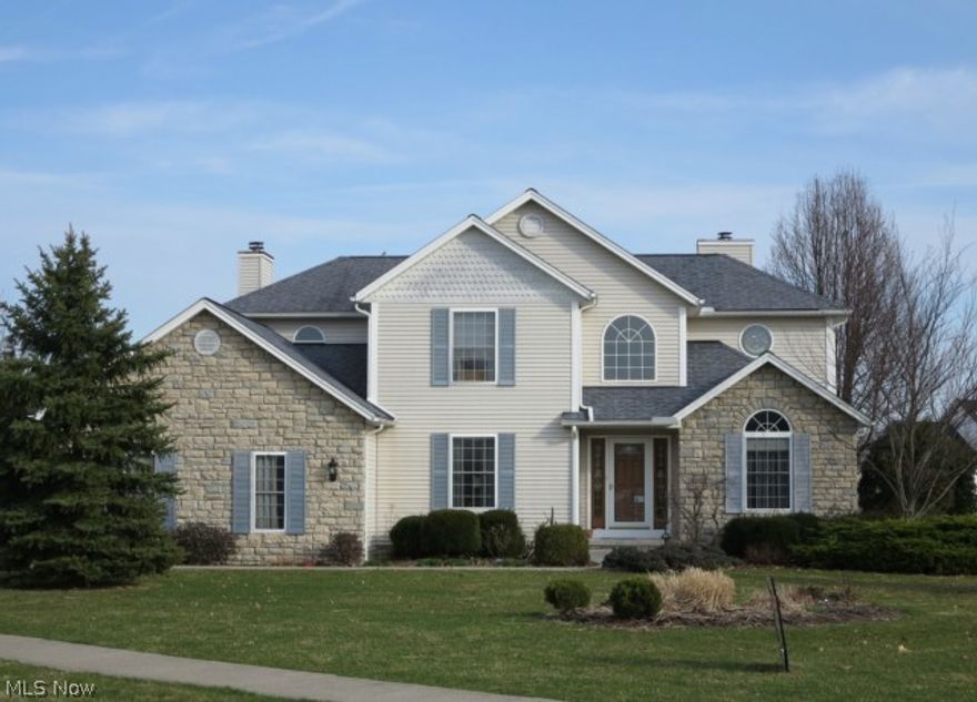 Desirable Regent Park!  This 4 bedroom home was the Parade model for LDA Builders so it included many upgrades. There's a first floor master bedroom suite with fireplace, a dramatic two story foyer and great room with floor to ceiling stone fireplace and a full wall built-in entertainment center. There's oak woodwork throughout, Corian counters, center island in kitchen, marble floors in foyer and half bath, whole house intercom system, security system, second floor loft, fenced yard, side entry garage and storage shed. There is plenty of additional finished living space in the lower level.  One year limited Home Warranty through America's Preferred Home Warranty included.