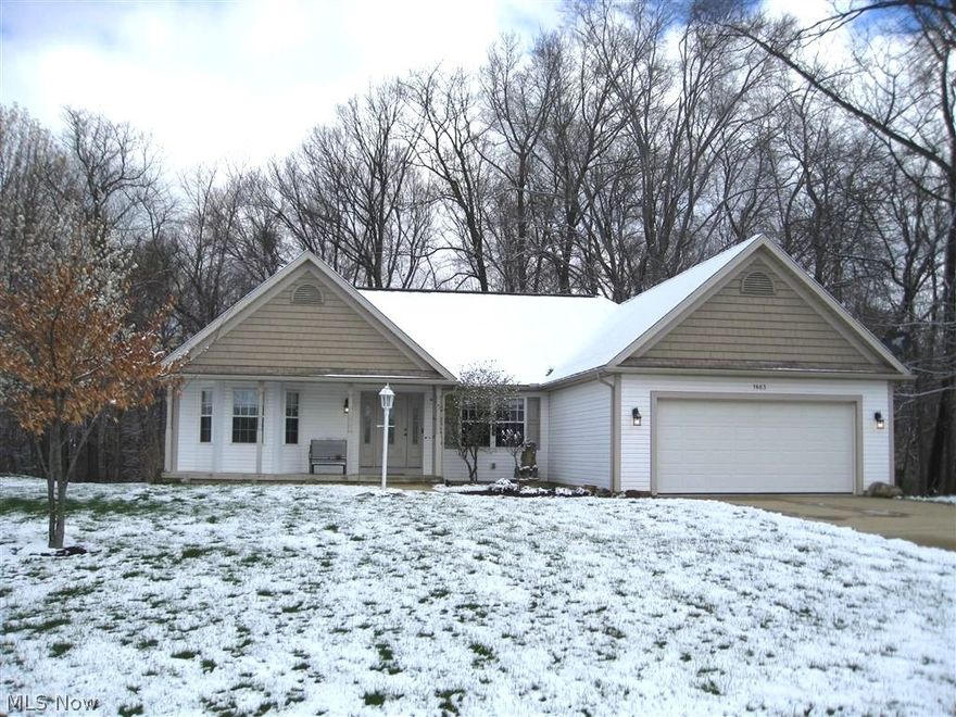 Unbelievable setting for 1463 Raceway Court, a custom built ranch!!! Dead end street and woods in the back yard, filled with wildlife. Ceramic tile floor in large foyer entry opens to the  great room with stone fireplace.The  bayed dinette gives way to serene wooded views. Cherry cabinets, a pantry, and breakfast bar in the fully applianced kitchen. There is a formal dining room accessed from the foyer or the kitchen. The split floor plan offer 2 bedrooms and full bath on one side of the house and a master suite on the other side. Generous master suite  with a full bath. His and hers walk-in closets, his and hers vanities, a separate shower, and a jetted tub complete the master bath. First floor laundry/ mudroom. Huge basement! Immaculate!!!!