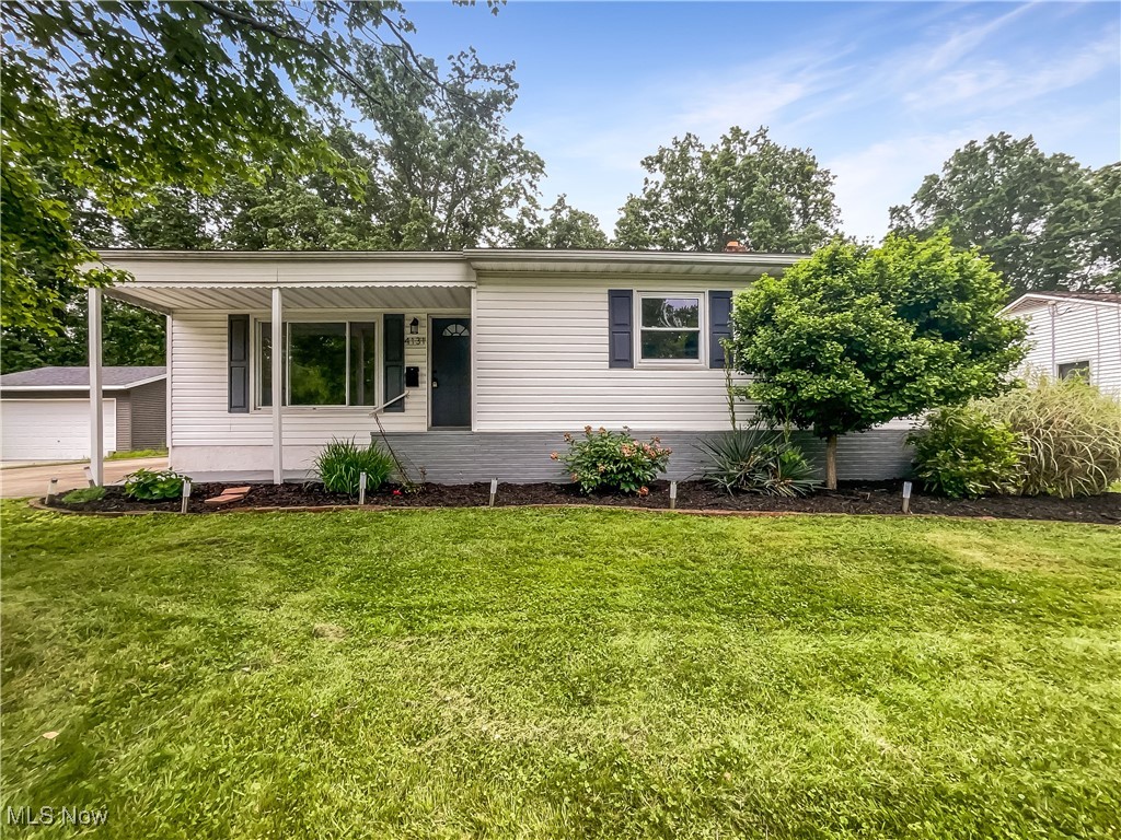 Check out this beautiful 3 bedroom, 2 bath ranch in the popular Stow community! This home features hardwood floors, fresh interior paint, and an upgraded kitchen. The vaulted ceiling, great natural light, and tasteful finishes make the living area the perfect place for gathering. In the adjacent kitchen, you'll find top notch features such as granite counters, stainless appliances, and upgraded cabinetry. All bedrooms are on the main level, plus there is additional flex space in the partially finished basement. The fenced in backyard provides the perfect private area to enjoy the outdoors. Don't miss this incredible opportunity.. 100-Day Home Warranty coverage available at closing