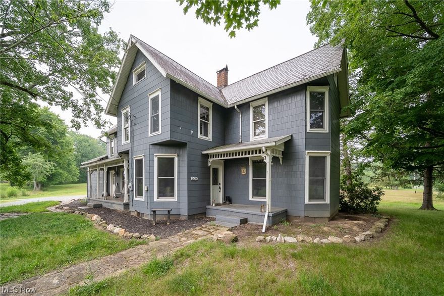 This beautifully restored Century Home sits on a 12.7 partially wooded acre corner lot.  Stained glass accents and original woodwork throughout home. The kitchen features cherry cabinets, stainless steel appliances, wood/laminate flooring, newer windows, pellet wood stove, and a pantry. The fireplace in the living room is a great focal point as well as an extra heat source to take off the winter chill. The master bedroom has 2 large closets, and cathedral/wood ceiling. The 3 additional bedrooms are good sized. The entry room off of the garage can be used as a mud room, craft room, or shop. This entry area has great storage spaces. Enjoy the outdoor patio during warmer days/nights. 32X40 Pole Barn has a concrete floor, dual heat wood/pellet burner, overhead door, sliding door, 110 amp, and 220 amp. The possibilities for this space are endless. Close to several school districts. This house is a must see.