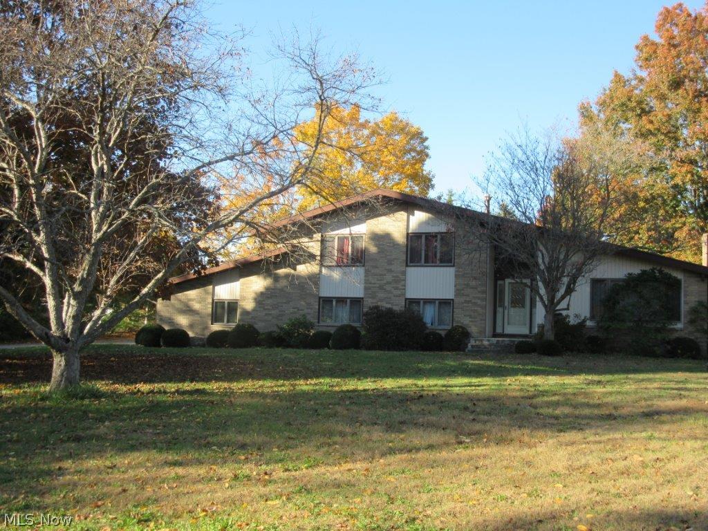 Cash buyers welcome to view this 2595 sq ft beautifully-designed all brick home - Creative ideas started ready to finish your way - 4 bedroom, 3.5 bath modern multi-level design with addition, 2 brick and stone fireplaces, built-ins and lots of storage, large sunroom near kitchen and formal dining room for easy entertaining. Level lot 165 x 215 Amazing all concrete drive and turn-around Contractors will appreciate all this home offers. (Suffield Township,
Mogadore mailing and schools, Portage County)