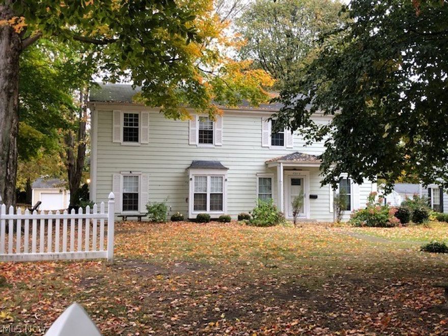 Move right in to this newly carpeted and professionally painted townhouse condo in Village Green. Cozy gas fireplace in living room with bay window. Patio off the entrance.  Newer light fixtures. Don't miss this move-in ready condo.