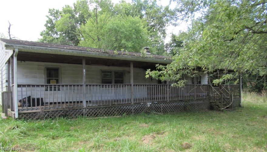 This 3 bedroom ranch sits on a quiet side street in a great location just south of Berlin Lake and State Route 14. All it needs is someone with a little vision and determination to bring it back to its glory. Sold as-is.