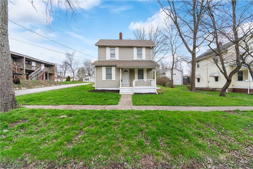Welcome home to this charming, fully renovated two-story gem in Ravenna, perfect for first-time buyers or a prime investment opportunity just 10 minutes from Kent State University. Thoughtfully redesigned from top to bottom, this turnkey home offers a like-new feel while maintaining its inviting original character. Inside, you’ll find 1,152 square feet of bright, airy living space featuring a smart layout, neutral tones, new flooring, plush carpet, and updated lighting throughout. The remodeled kitchen boasts brand-new stainless steel appliances, while the updated full bathroom is clean and modern. A convenient first-floor bedroom and a newly added laundry area enhance everyday functionality, with two additional bedrooms located upstairs. The home is situated on a desirable corner lot with a brand-new concrete driveway, updated decks, and fresh exterior finishes. Move in with total peace of mind thanks to an extensive list of updates, including new vinyl siding, a dimensional shingle roof (2021), a new hot water tank (2023), a serviced furnace, and new plumbing. The home also features a professionally waterproofed basement and a partial foundation replacement backed by structural certification. The basement provides abundant storage, a dedicated workspace, or future living potential. Ideally located near the Portage Hike and Bike Trail and West Branch State Park, with easy access to Akron and Cleveland, this home perfectly blends comfort, convenience, and lasting value.