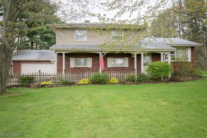 This superb property is just less than 4 acres (3 parcels) within the City limits, in the Award Winning School district of Columbiana ~ a great place to call home.  Woods flank the backyard for added privacy of the in ground 20 x 40 pool.  The well maintained home is 2199 square feet, with public water and electric, natural gas and septic. The first floor boasts a spacious foyer,  LR with a wood burning stone fireplace and beamed ceiling, full bath with shower and expansive Sun room off the back of the house.  A cheery eat-in kitchen and spacious FR round out the second floor.  Three bedrooms with sizeable closets and newer carpeting, two hall closets and main bath with double sinks are on the upper level.  Boiler and vinyl siding new in 2008, barn roof in 2013.   A partial basement, rare in split-levels, houses the washer and dryer and added storage.  Property being sold "AS IS" seller making no repairs or warranties.  Priced for a quick sale.