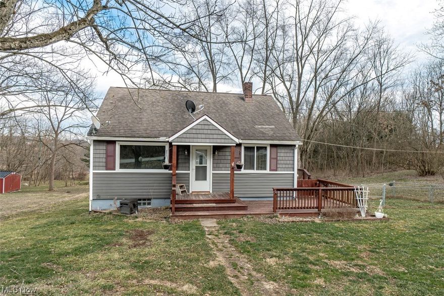 Looking for a small hobby farm that is in a perfect quiet setting?  This little bungalow and the 2 acres, provides the peacefulness of the country life, but just minutes away from the hustle and bustle of the city and freeway access.  It's so easy to picture yourself sitting on the back porch enjoying that morning cup of java or tea while watching the morning sun glisten on the pasture's morning dew. It also includes a perfectly placed dog run just outside the side door. The 24x40 sized barn has electric and water and is ideal for small farm animals, or even that horse or two!  Near the fenced pasture, is a small man-made duck pond for any feathered friends, or to allow your livestock to utilize.  There is also extra storage in the detached 2 car garage!  Country living at it's finest!  Well and septic inspections have already been completed for your peace of mind!  Contact your favorite realtor today!